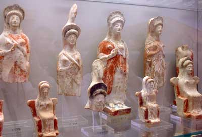Case full of female figures.