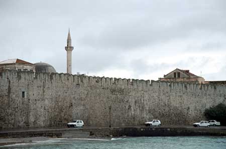 View from the ship of the city wall along the edge of the port.