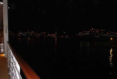 New Year's lights decorating ships in the port of Athens