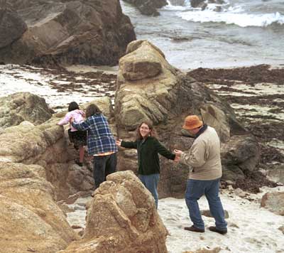 Kids climbing on the rocks